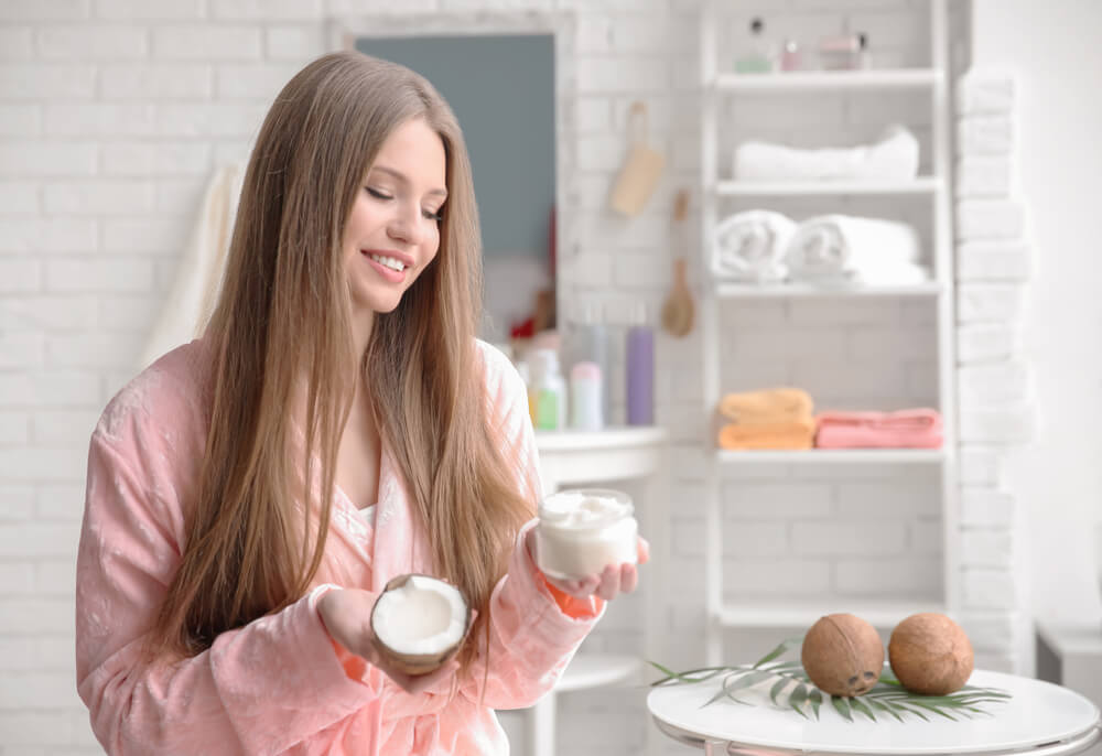 young women with coconut oil